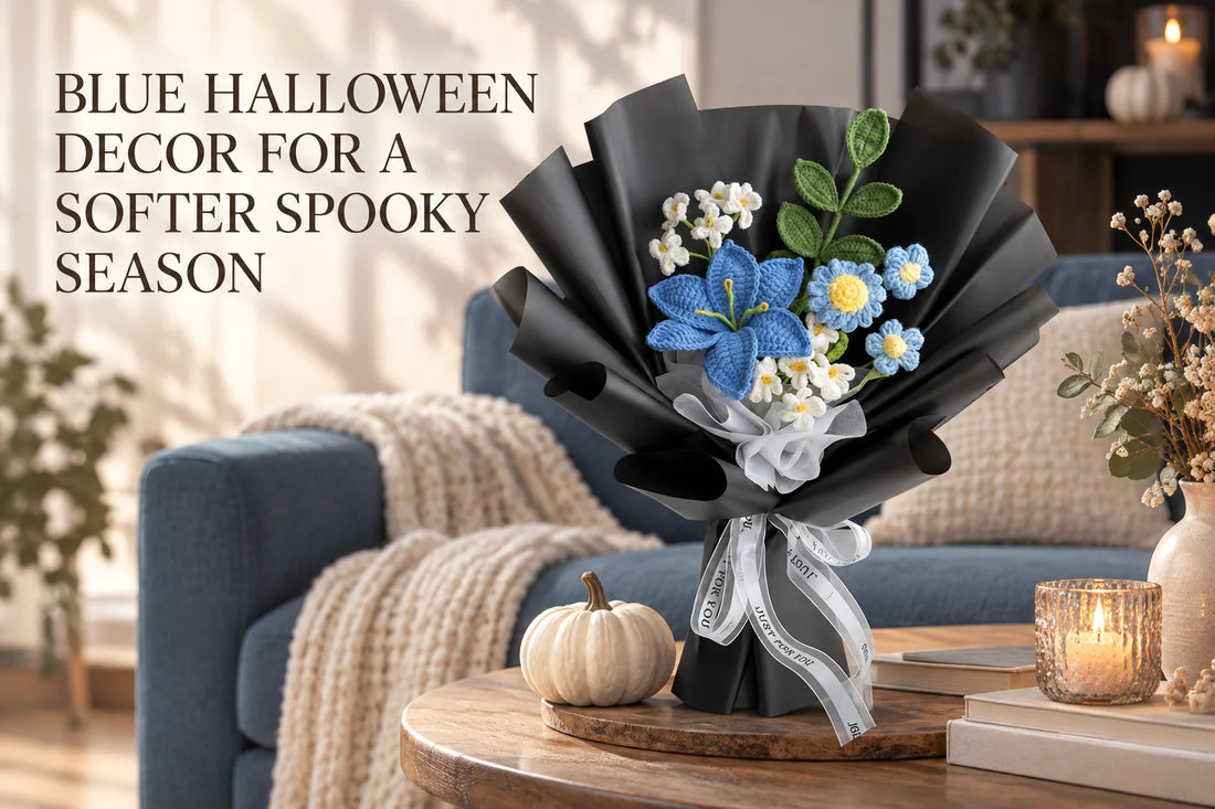 Blue Halloween Decor for a Softer Spooky Season — Blue lily crochet bouquet in black wrapping beside an ivory pumpkin