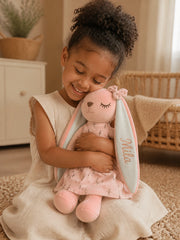 Pink plush bunny with an embroidered child's name