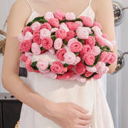 White crochet flower blanket with pink ombre roses