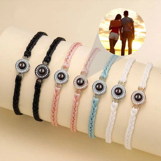 Woven cord bracelet with a hidden photo projection bead