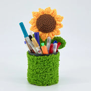 Crochet sunflower pen holder in a green pot with stainless steel core