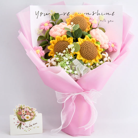 Crochet sunflower and rose bouquet in pink wrapping