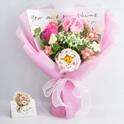 Handmade crochet bouquet of carnation, peony and tulip, wrapped and ready to gift