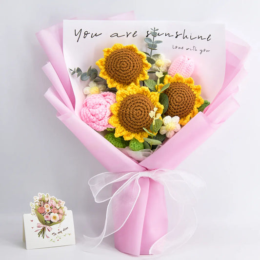 Crochet sunflower, rose and tulip bouquet in pink wrapping