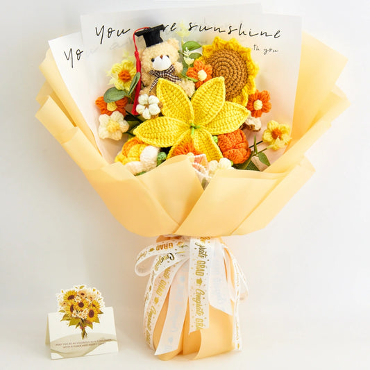 Yellow crochet graduation bouquet with a graduation bear