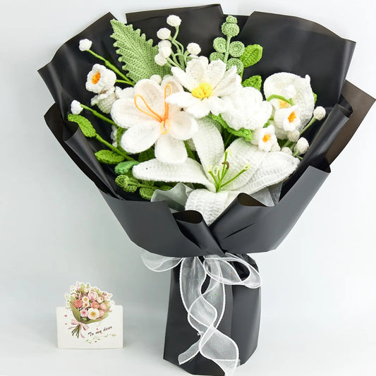 White crochet bouquet with greenery in black wrapping