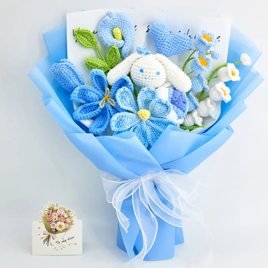 Blue and white crochet bouquet with a crochet character doll