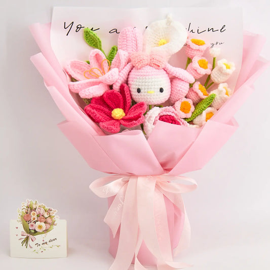 Pink and white crochet bouquet with a crochet character doll and matching wrapping
