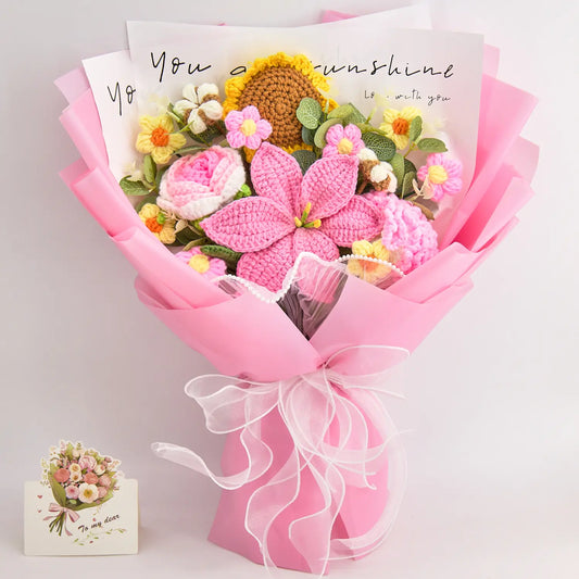 Pink crochet bouquet of sunflower, lily, rose and carnation with 14 blooms