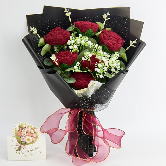 Crochet bouquet of six red roses in black wrapping