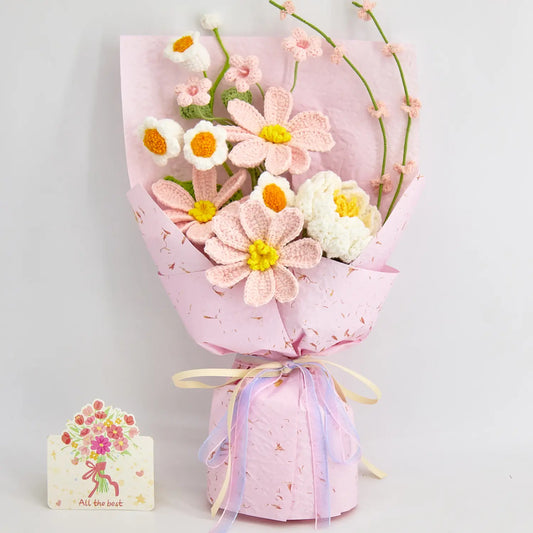 Crochet bouquet of pink Galsang flowers with a white peony