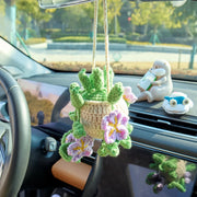 Purple crochet car hanging with flowers and leaves