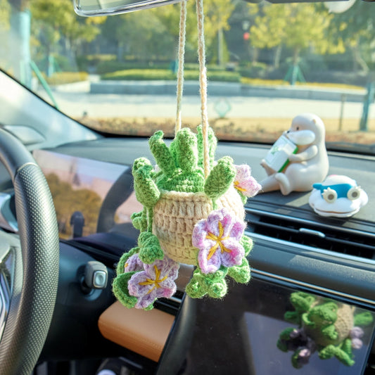 Purple crochet car hanging with flowers and leaves