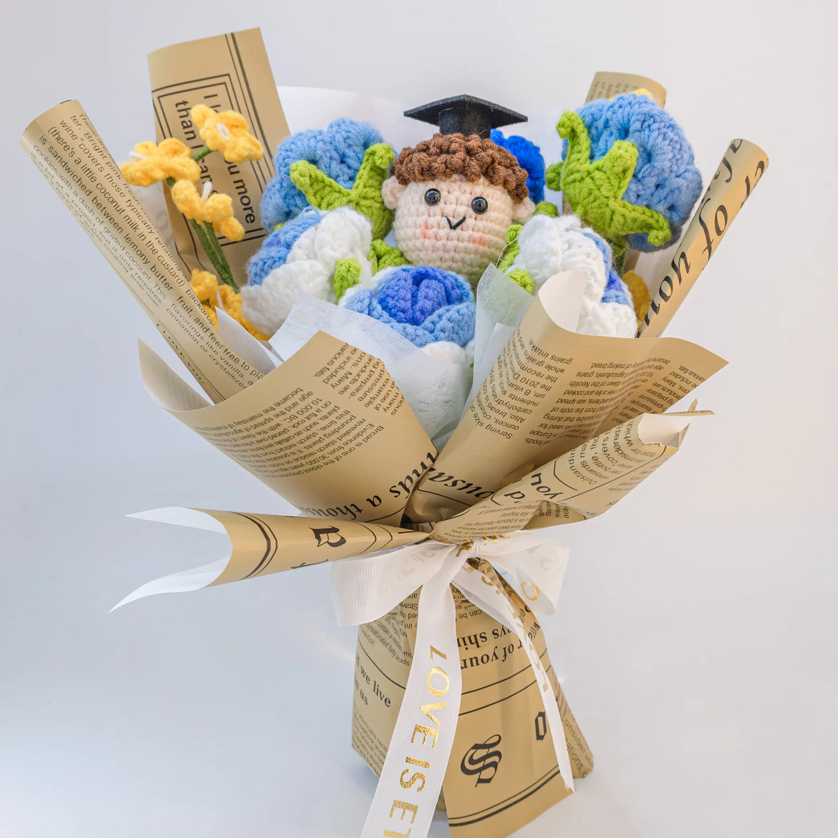 YSHomy Blue Crochet Flowers Bouquet with Newspaper Wrapping for Boy Graduation