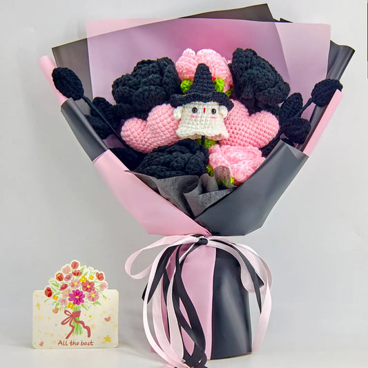 Pink and black crochet rose bouquet with a white ghost in a witch hat and matching wrapping