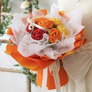 丸いかぎ針編みは黄色と赤の花束をバラに