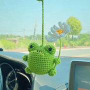 Crochet frog doll car hanging holding a flower