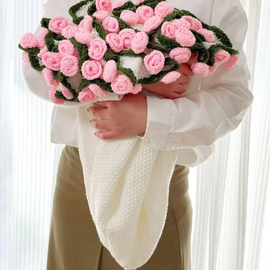 Crochet flower blanket worked in pink roses