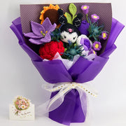 Full purple crochet bouquet with KM doll, sunflower, red roses, purple lily, tulip, lily of the valley, and purple wrapping