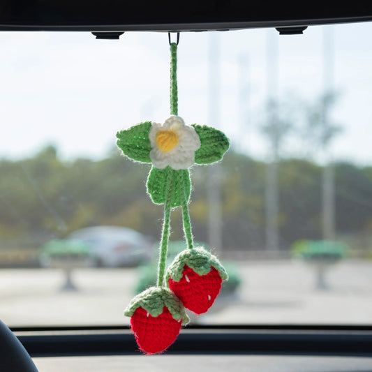 Double-ended crochet car hanging with a strawberry and a daisy
