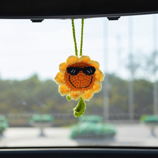 Double-sided crochet sunflower car hanging with sunglasses and a smiling face