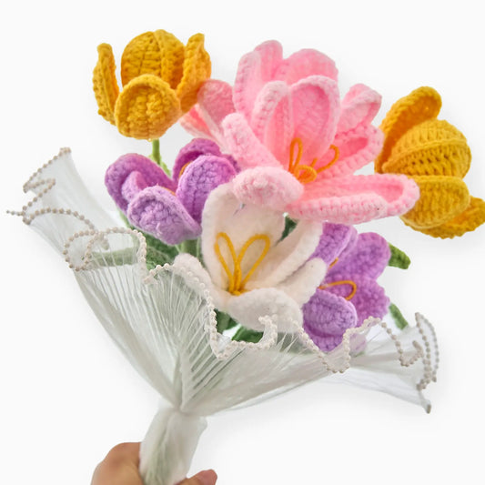 Multicoloured crochet bouquet of open tulips